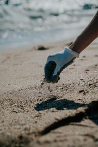 Damm volunteers promote a beach clean-up campaign